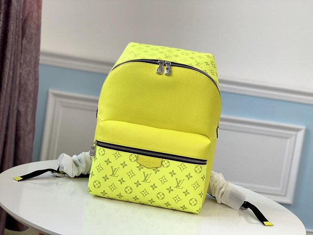 Louis vuitton original taiga leather discovery backpack M30228 lemon yellow